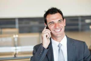 businessman-phone-laughing-business-man 3